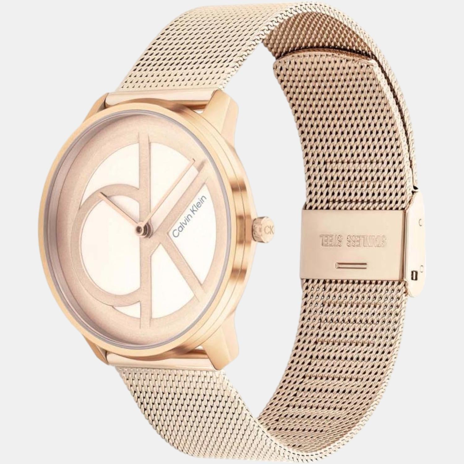 Calvin Klein Statement gold watch angled view with mesh strap and logo dial