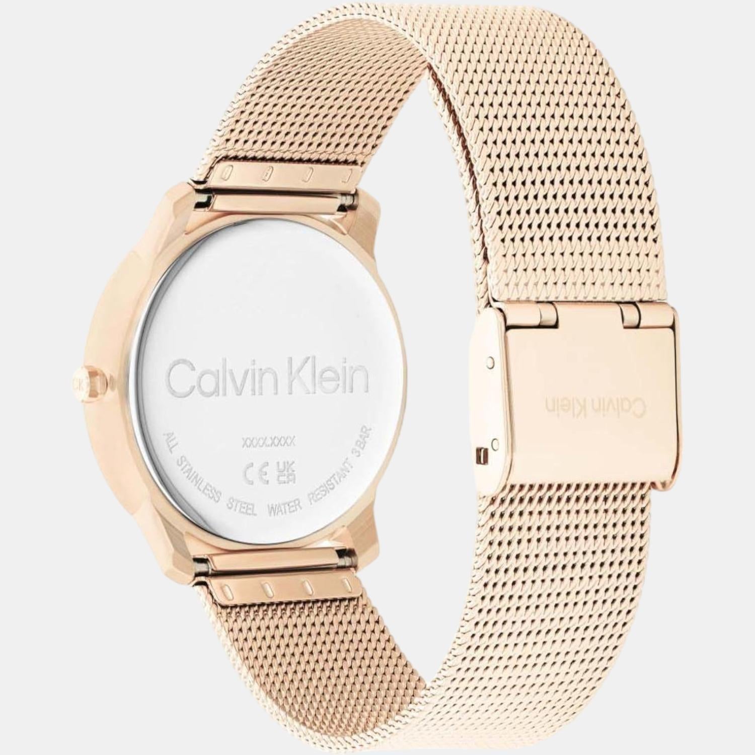 Calvin Klein Statement watch showing caseback engraving and mesh strap closure