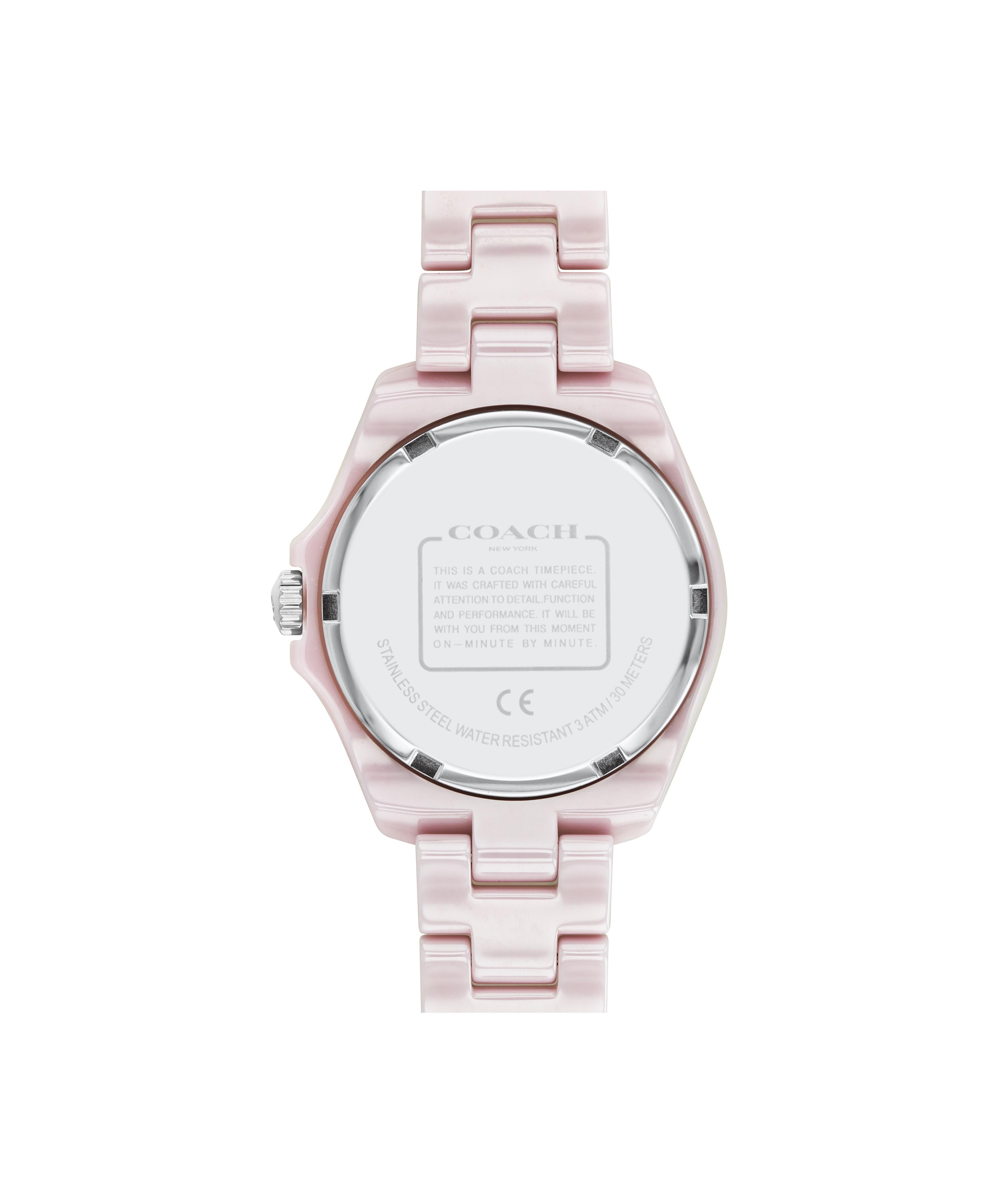 Coach women's watch caseback showing stainless steel back with engraved branding
