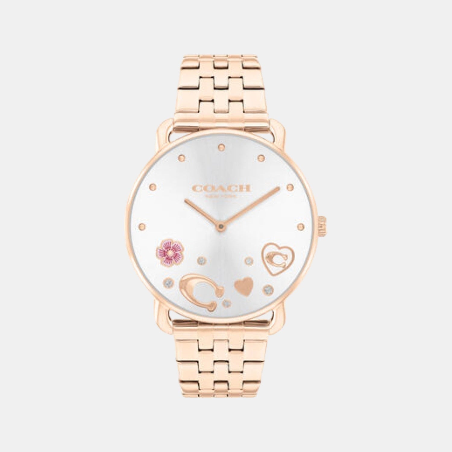 Coach rose gold women's watch with white dial, decorative heart and planet details, and rose gold-toned steel bracelet
