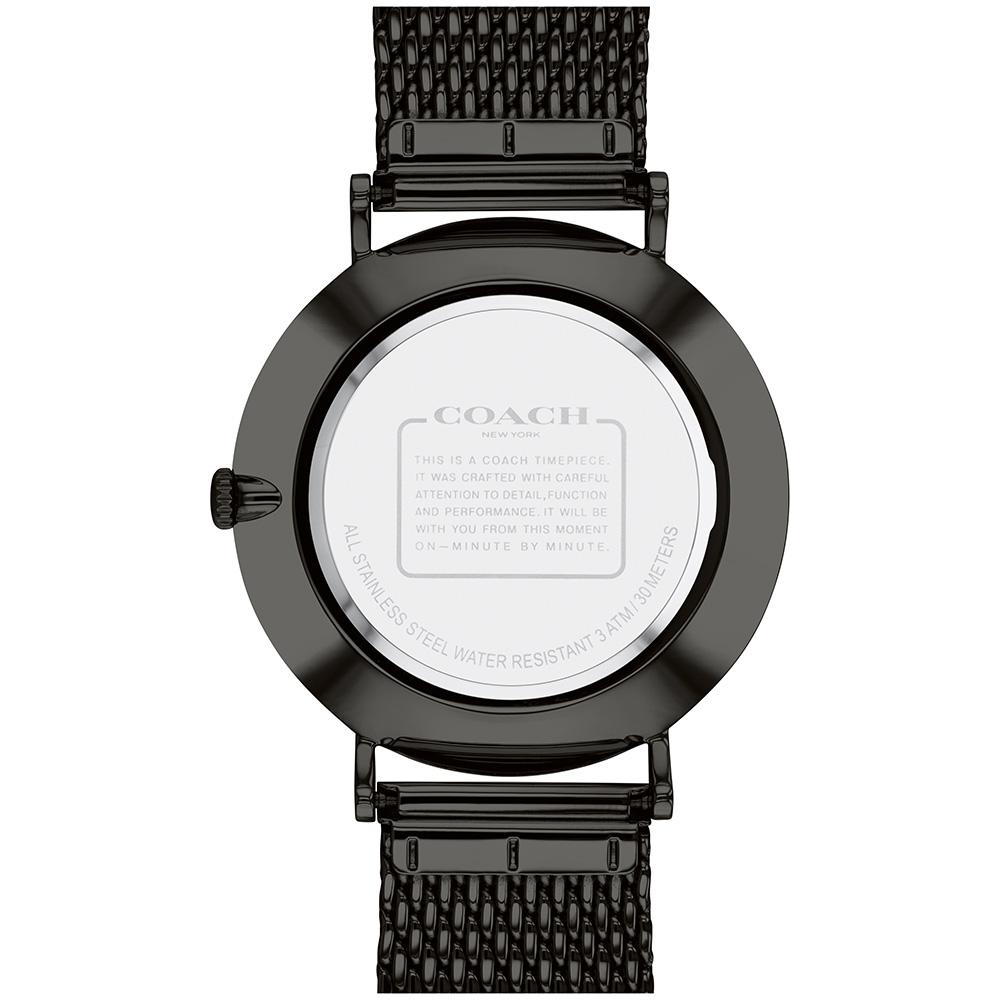 Coach Charles watch caseback showing engraved Coach branding and specifications