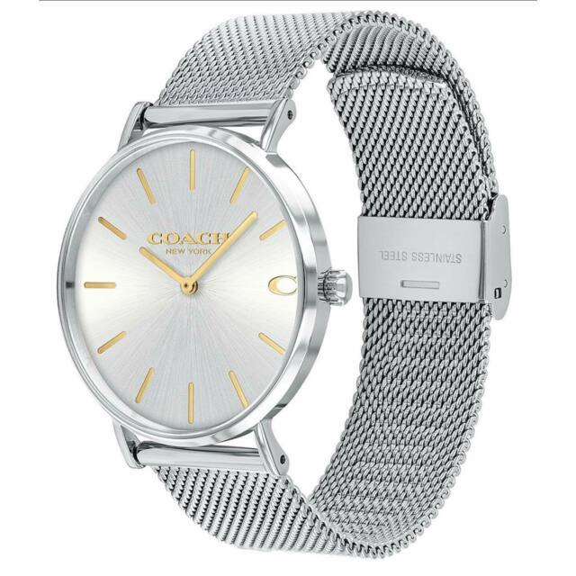 Coach Charles men's watch on wrist showing silver mesh bracelet and stainless steel case
