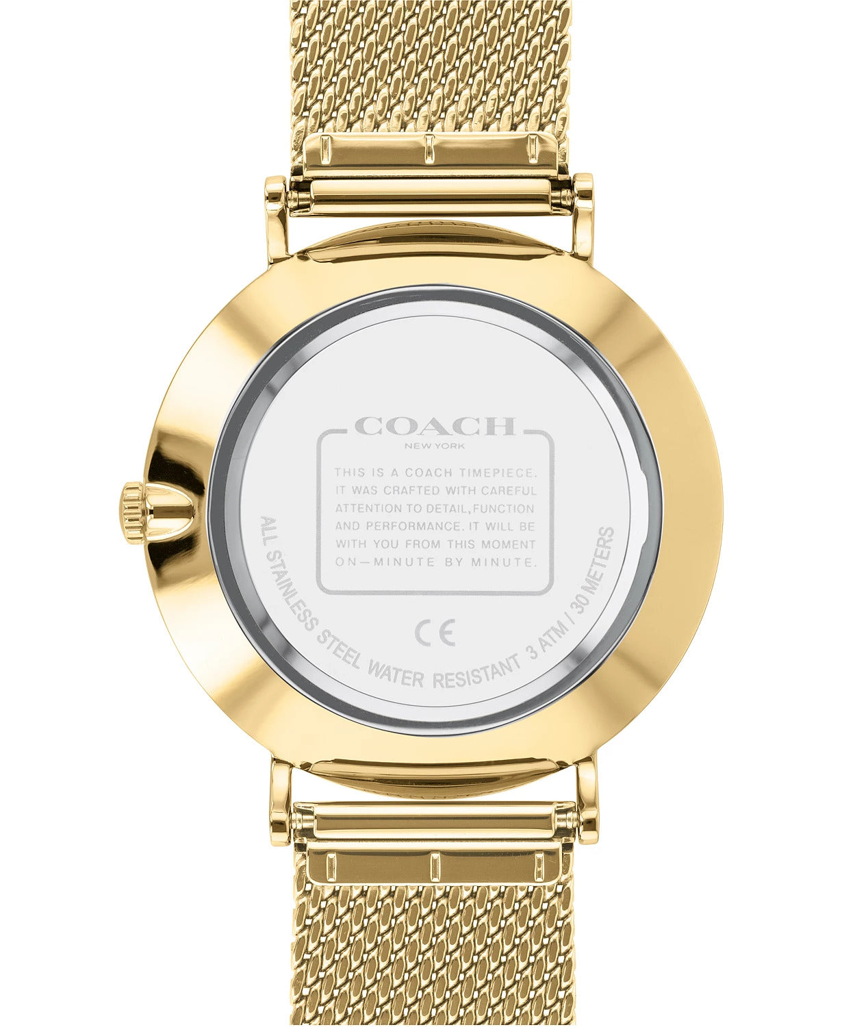 Coach Charles watch caseback showing gold-tone case back with engraved text