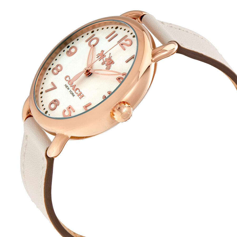 Coach Delancey watch side view showing white leather strap and rose gold case