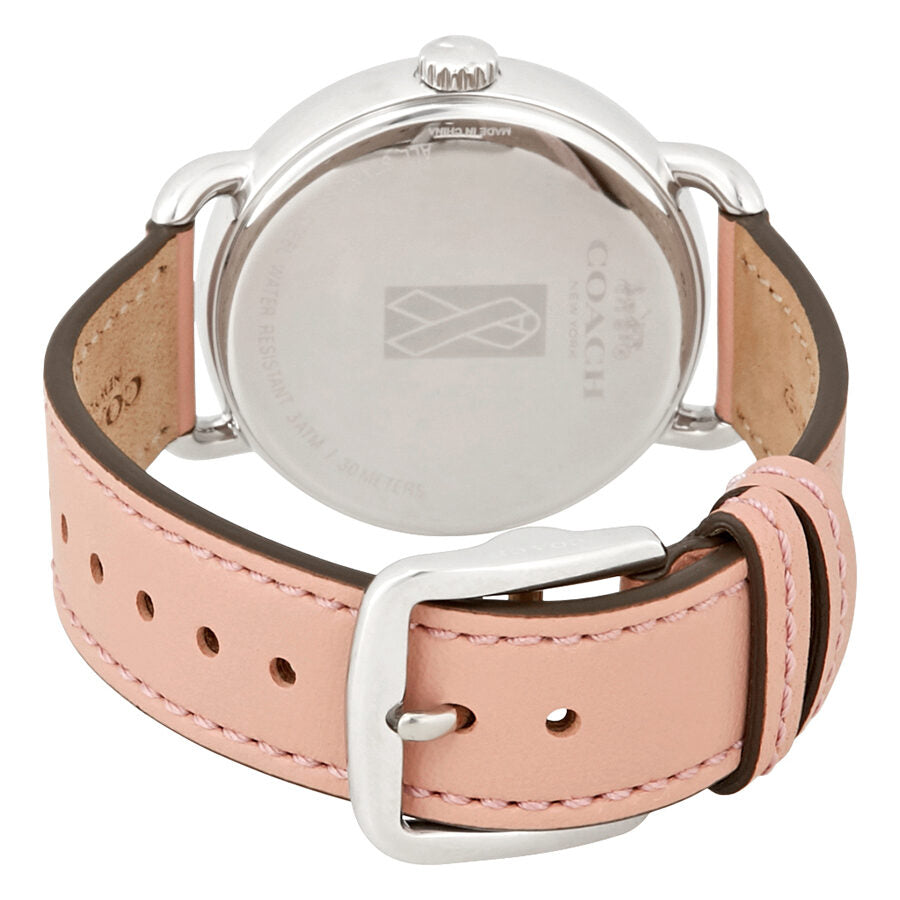 Coach Delancey watch caseback with stainless steel and tan leather strap visible