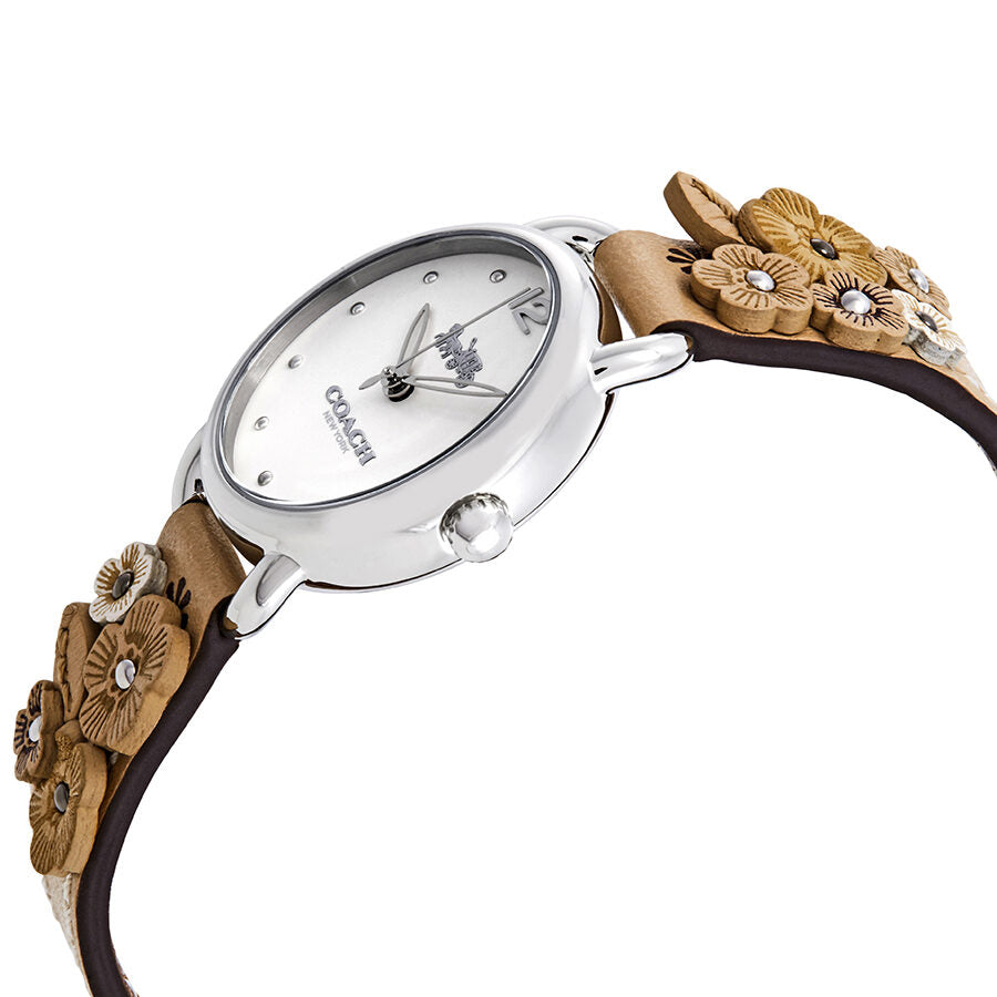 Coach Delancey watch side view showing white dial and tan leather strap with flowers