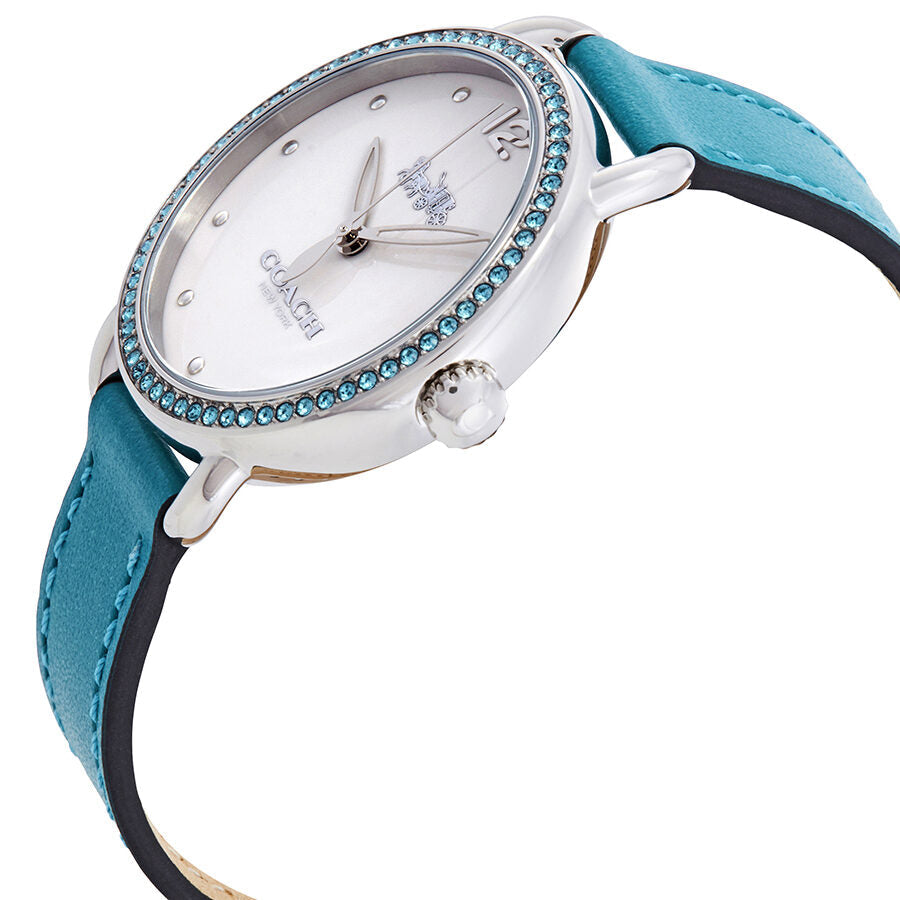 Coach Delancey watch from side angle showcasing crystal bezel detail and blue leather strap