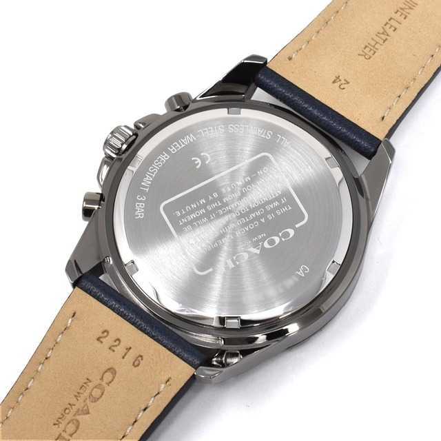 Coach Kent watch caseback showing stainless steel transparent case back with engraved text and brand details