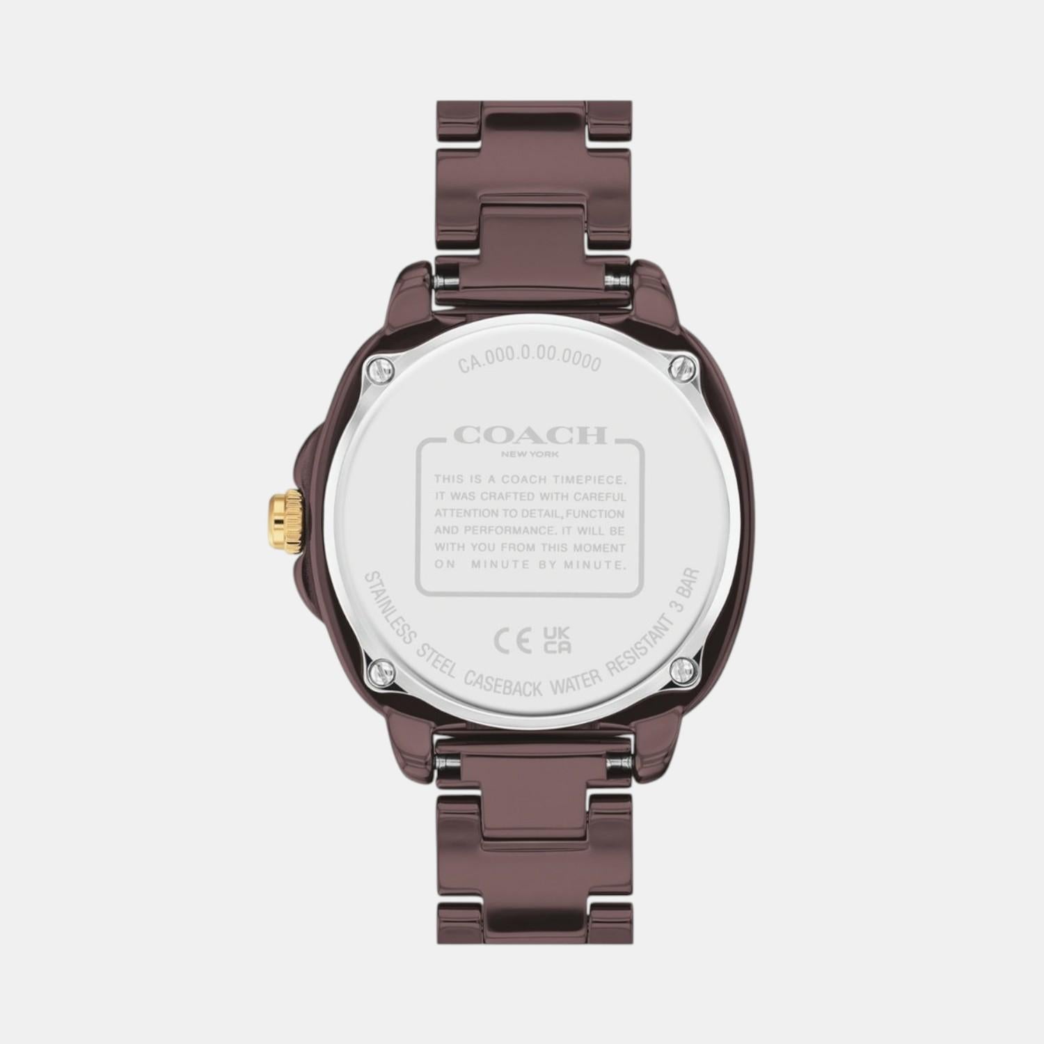 Coach Kitt watch caseback showing silver disc with Coach branding and specifications