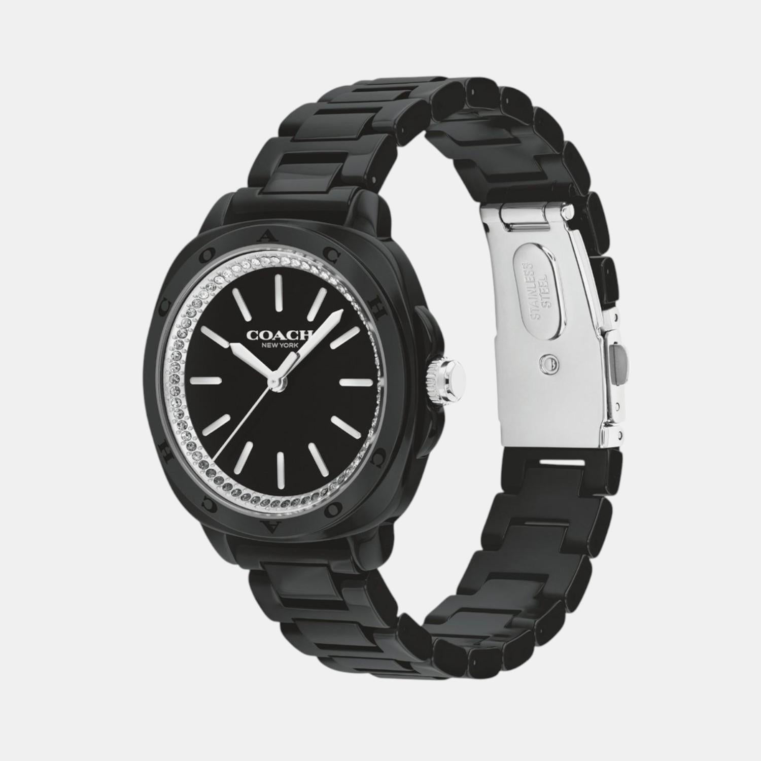 Coach Kitt ceramic watch shown from angled view with stainless steel clasp visible