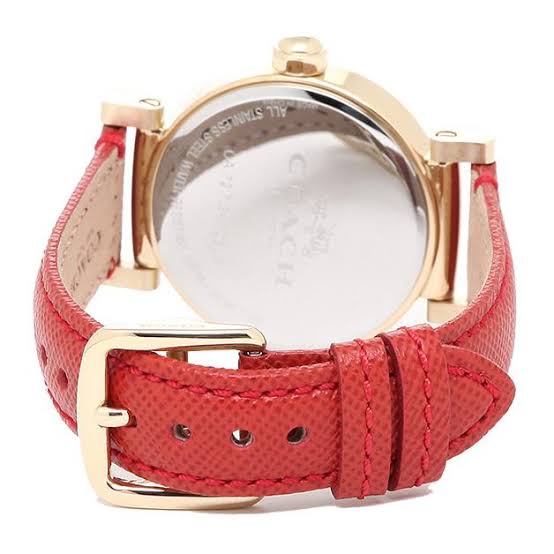 Coach Madison watch caseback showing transparent crystal with red leather strap detail