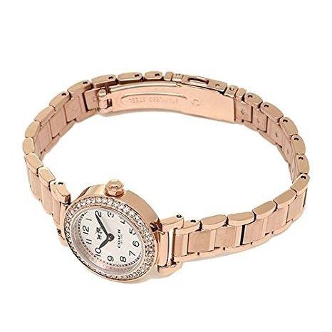 Coach Madison rose gold watch on wrist showing dial and bracelet