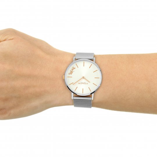 Coach Perry quartz watch on wrist with silver mesh strap and silver dial