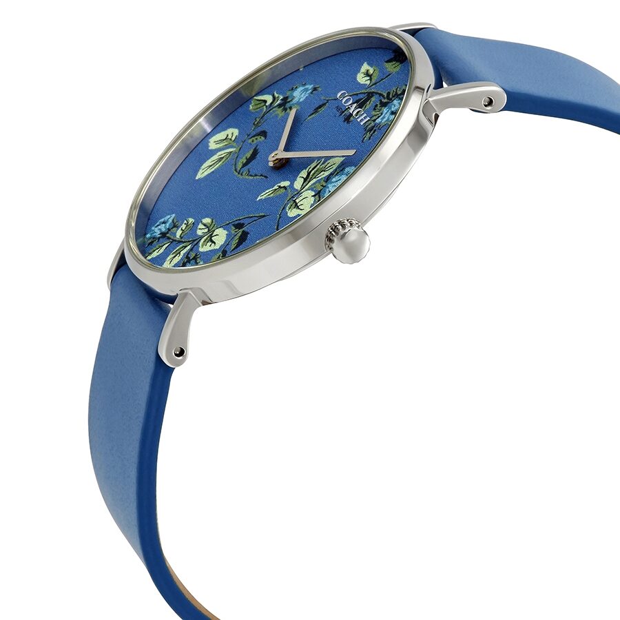 Coach Perry watch side angle showing blue dial with botanical print and stainless steel case