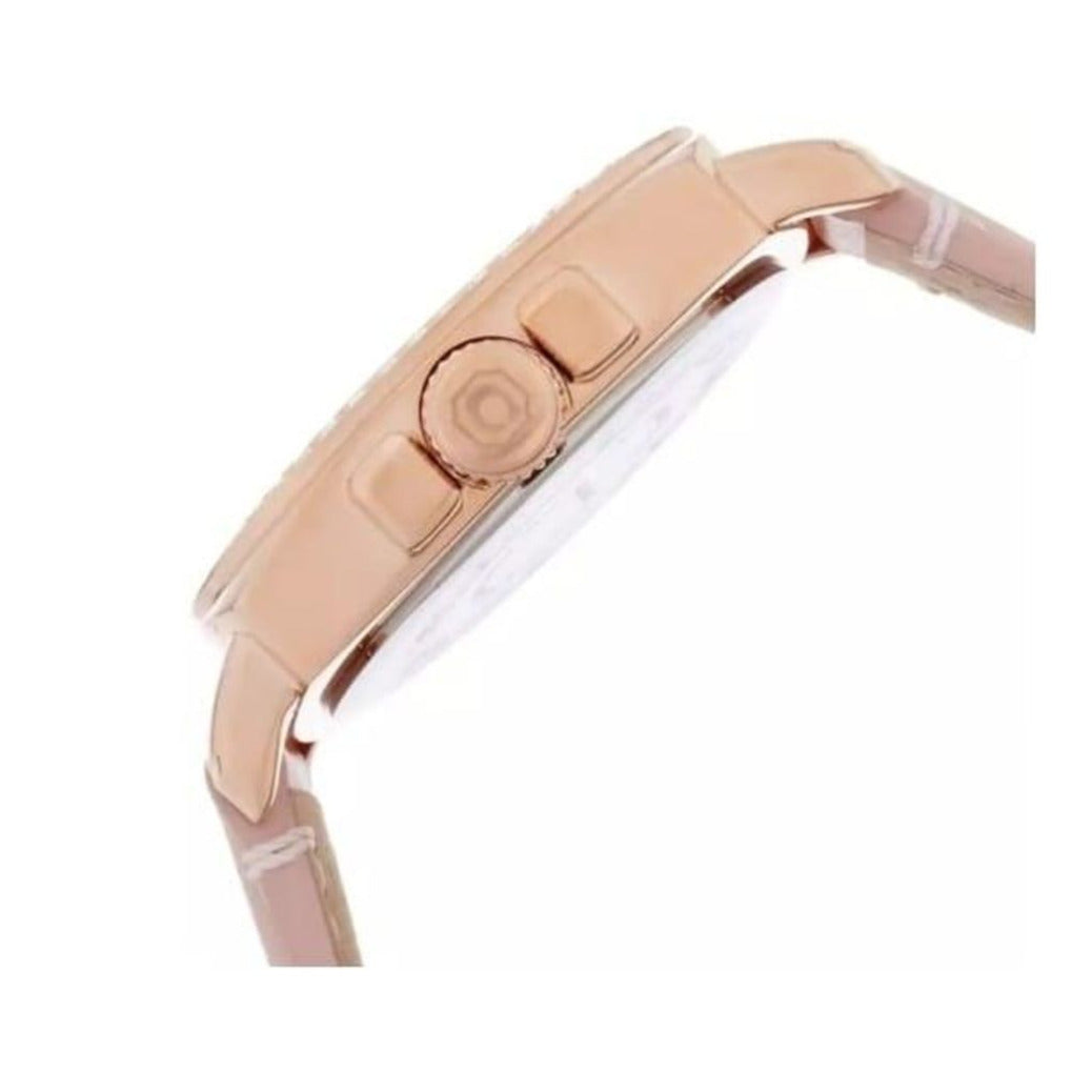 Side view of Coach watch showing rose gold case and pink leather strap