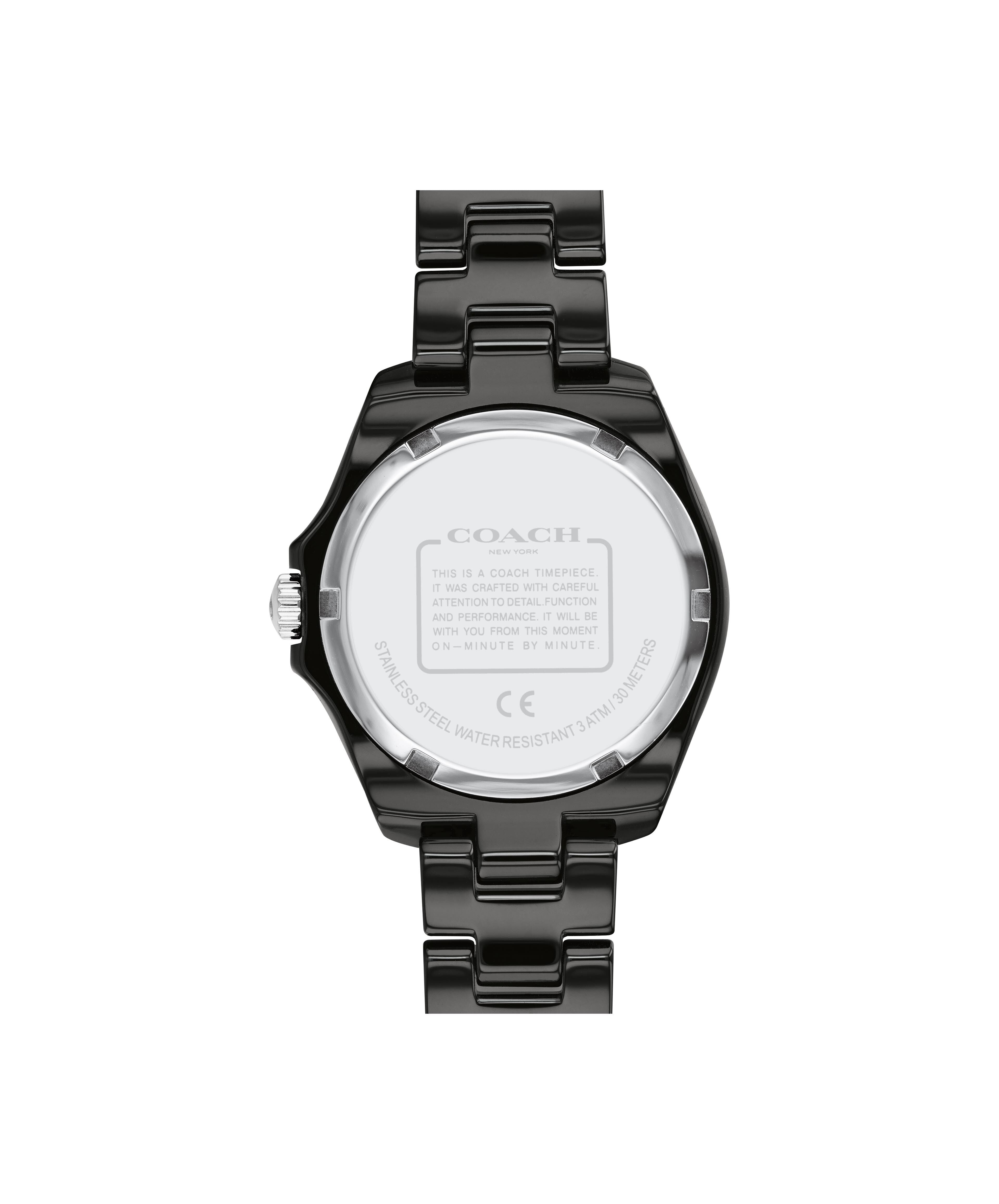 Coach Preston watch caseback with engraved Coach logo and specifications