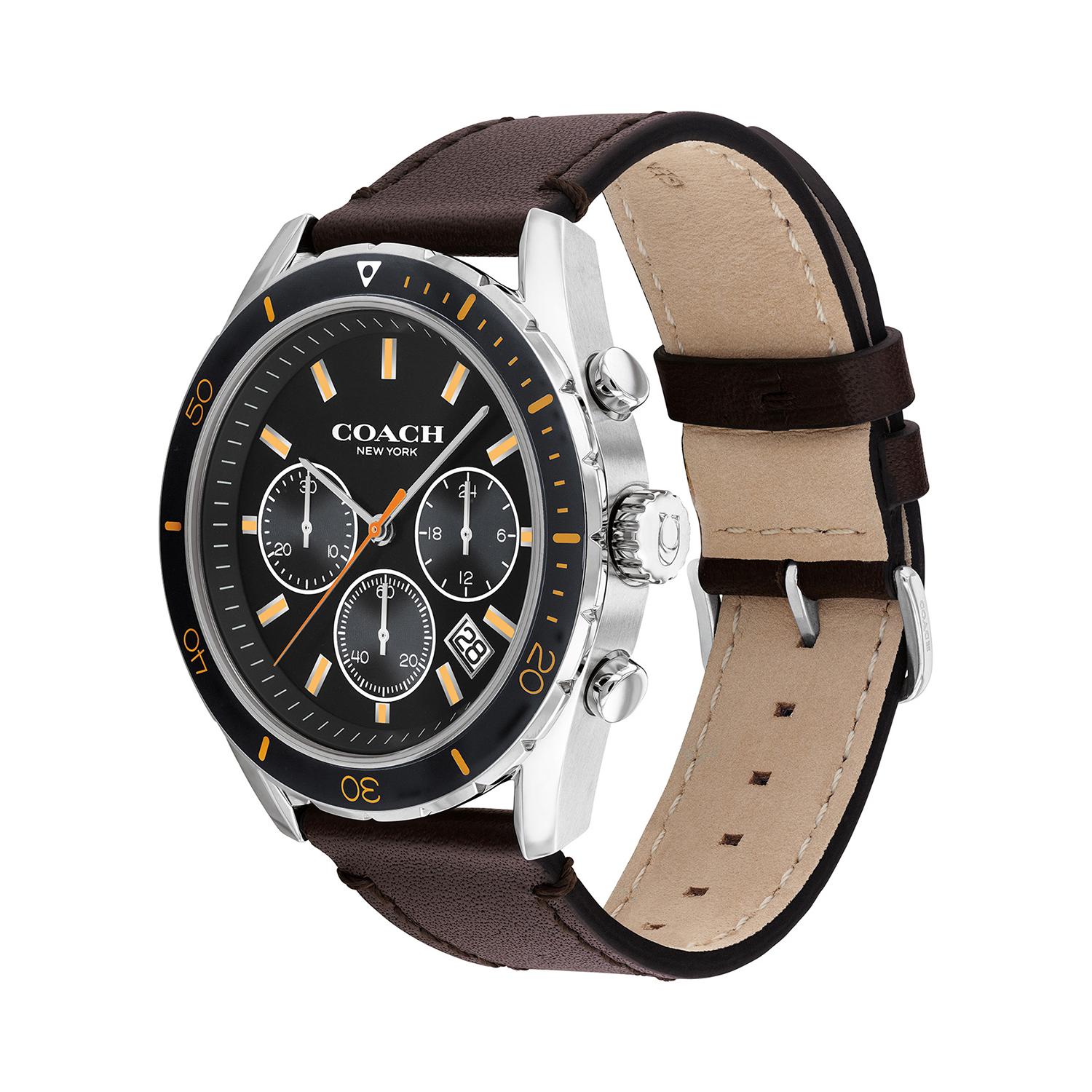 Coach Preston watch shown at angle revealing brown leather strap and silver case profile