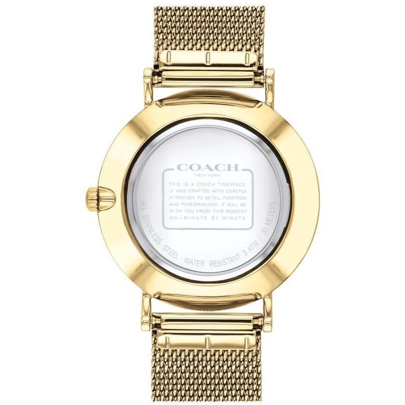 Coach watch caseback showing gold-tone case with engraved Coach branding and specifications