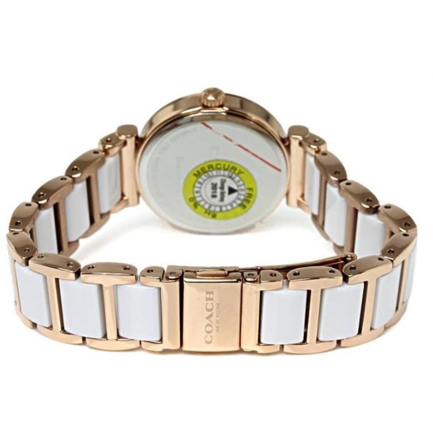 Coach Sport watch caseback showing rose gold case and white ceramic link bracelet construction