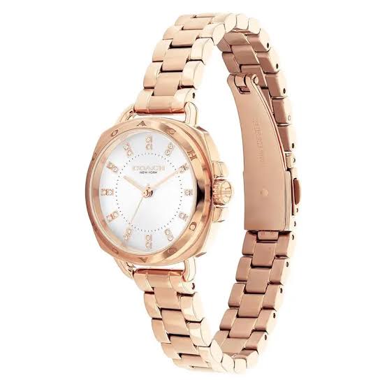 Coach Tatum rose gold ladies watch with silver dial shown from angled side view