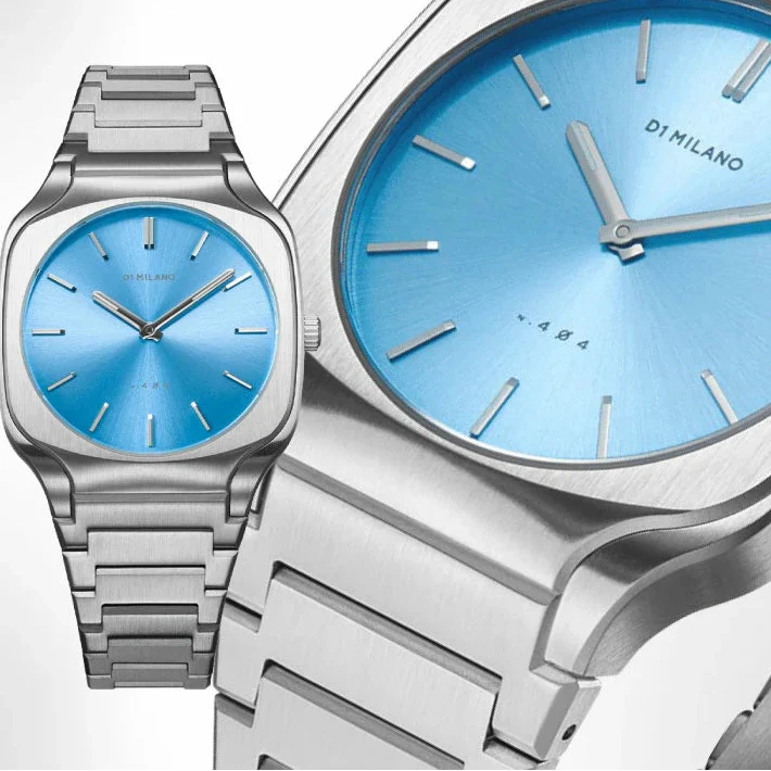 Close-up detail of D1 Milano Square Maldives sea blue dial with index markers and branding