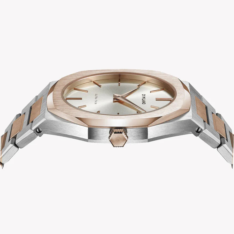 Side angle view of D1 Milano UTBJ01 watch showing rose gold case and two-tone bracelet