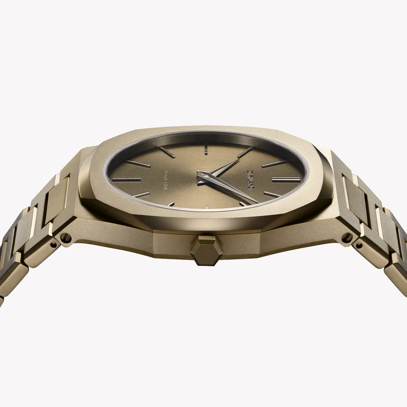 D1 Milano UTBJ36 watch angled side view showing gold case and dial details