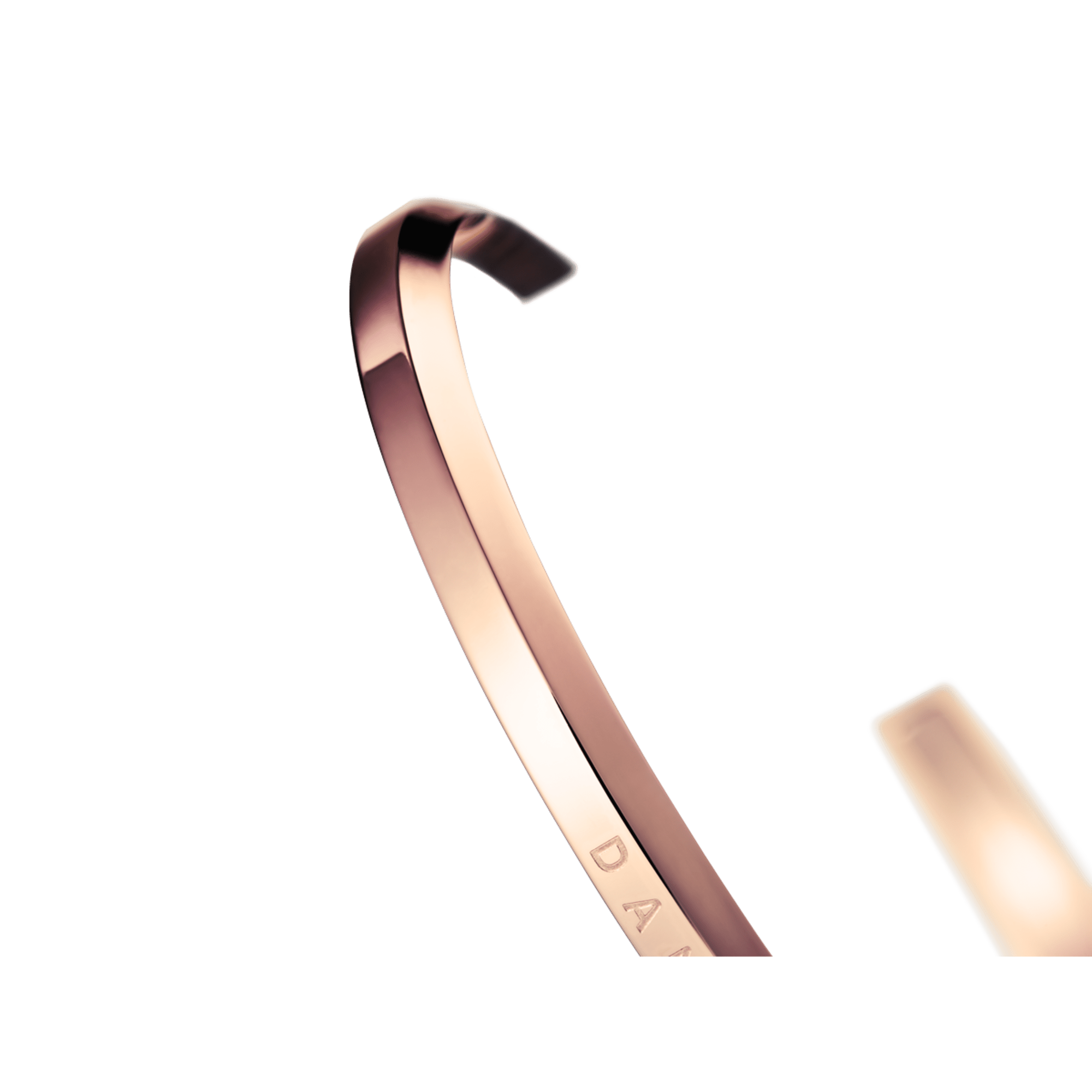 Angled view of rose gold bracelet showing the curved cuff design and depth
