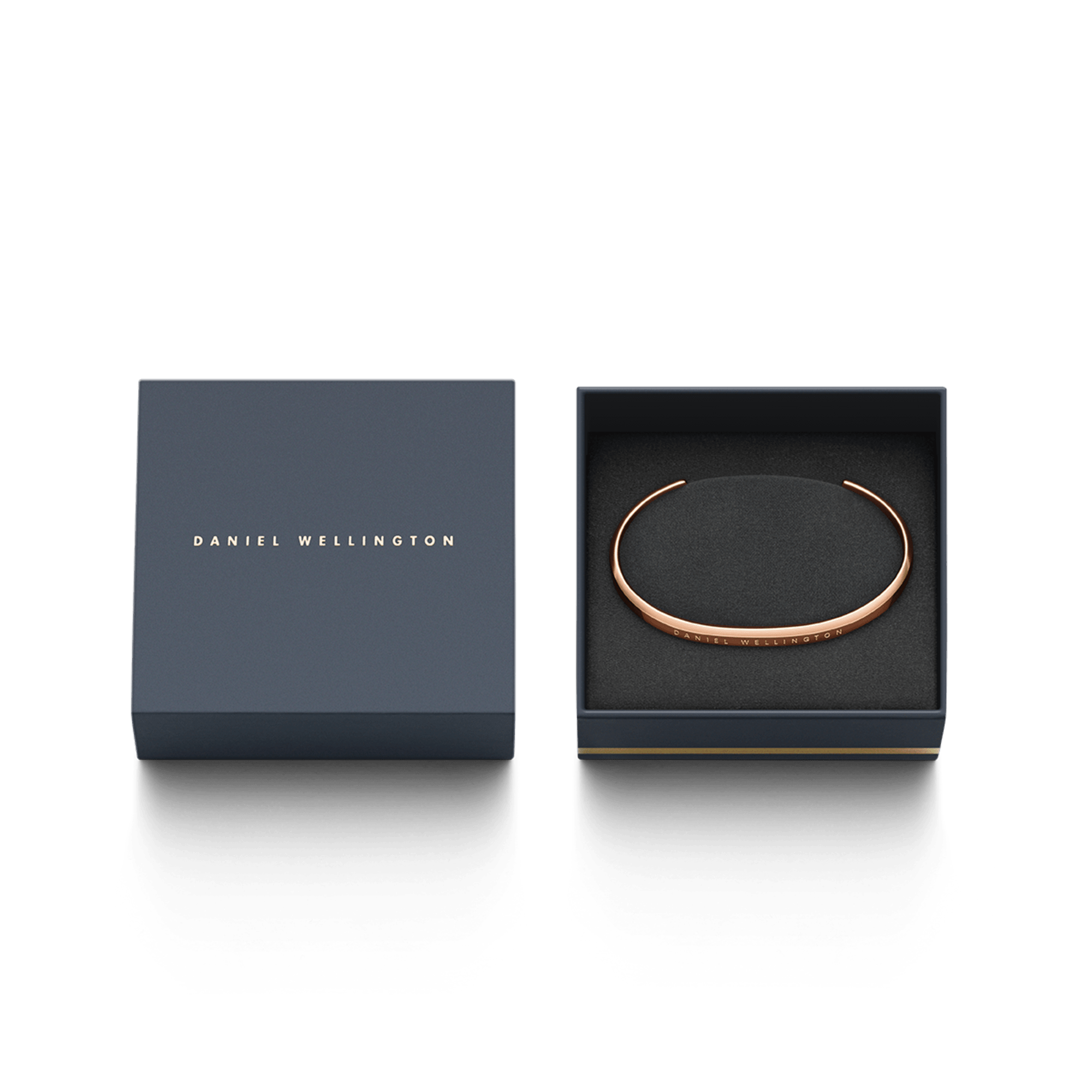 Daniel Wellington branded packaging box containing rose gold bracelet, shown open and closed