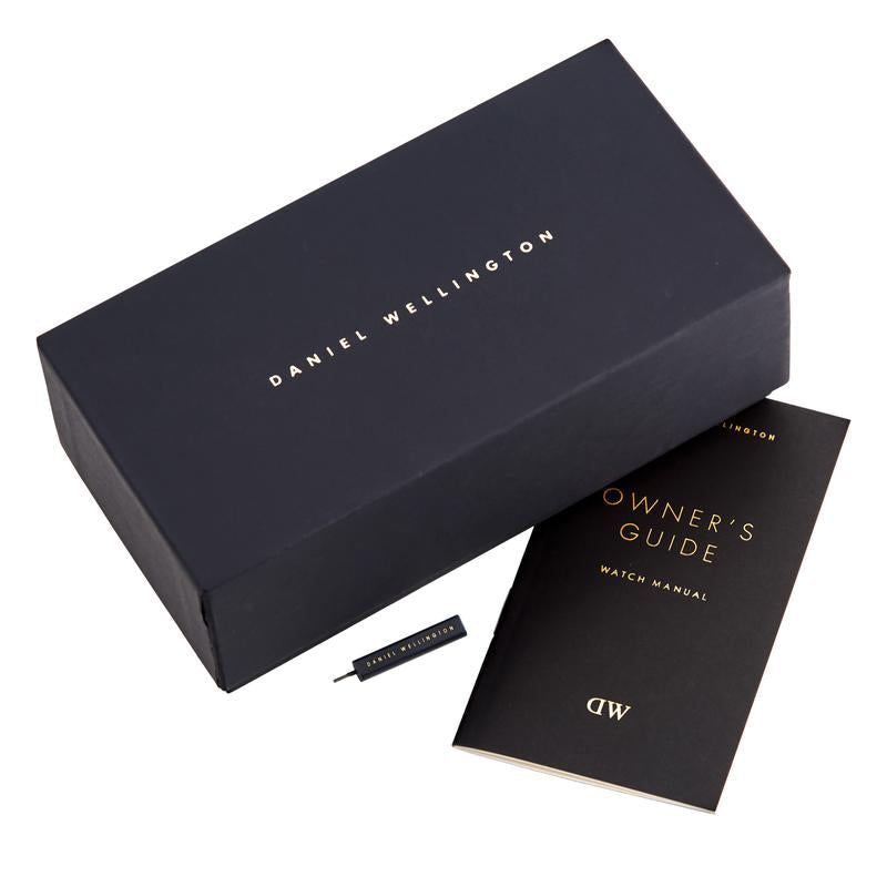 Daniel Wellington Classic Bristol watch packaging showing branded box, owner's guide, and watch cloth