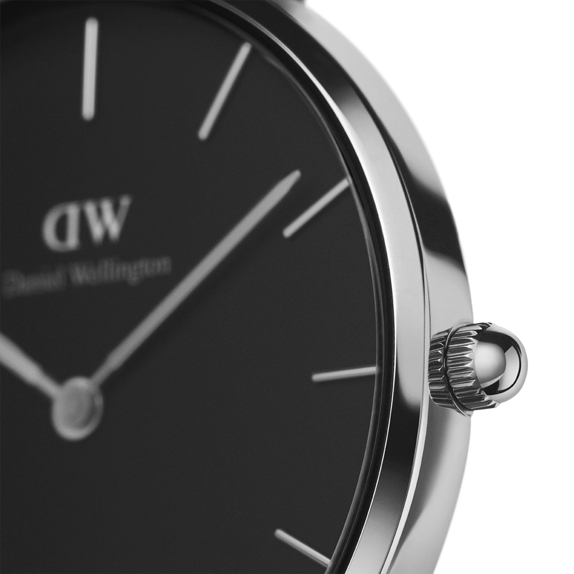 Close-up of black dial with silver hour markers and DW logo