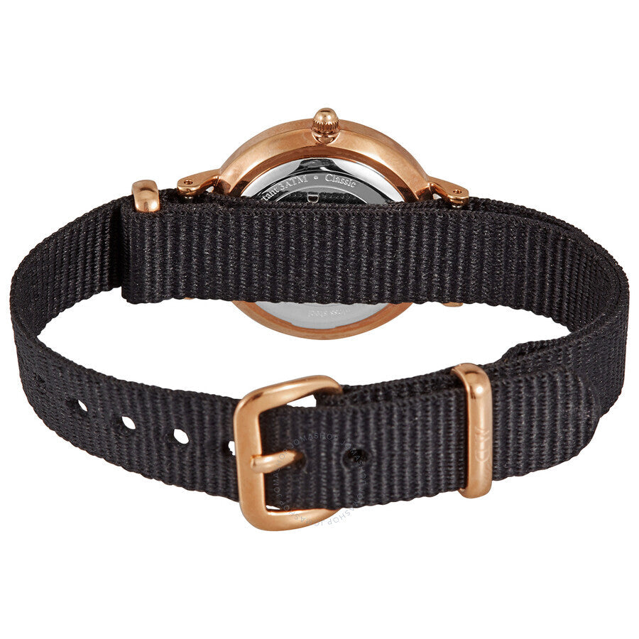 Back view of Daniel Wellington Petite watch showing caseback and black nylon strap with buckle