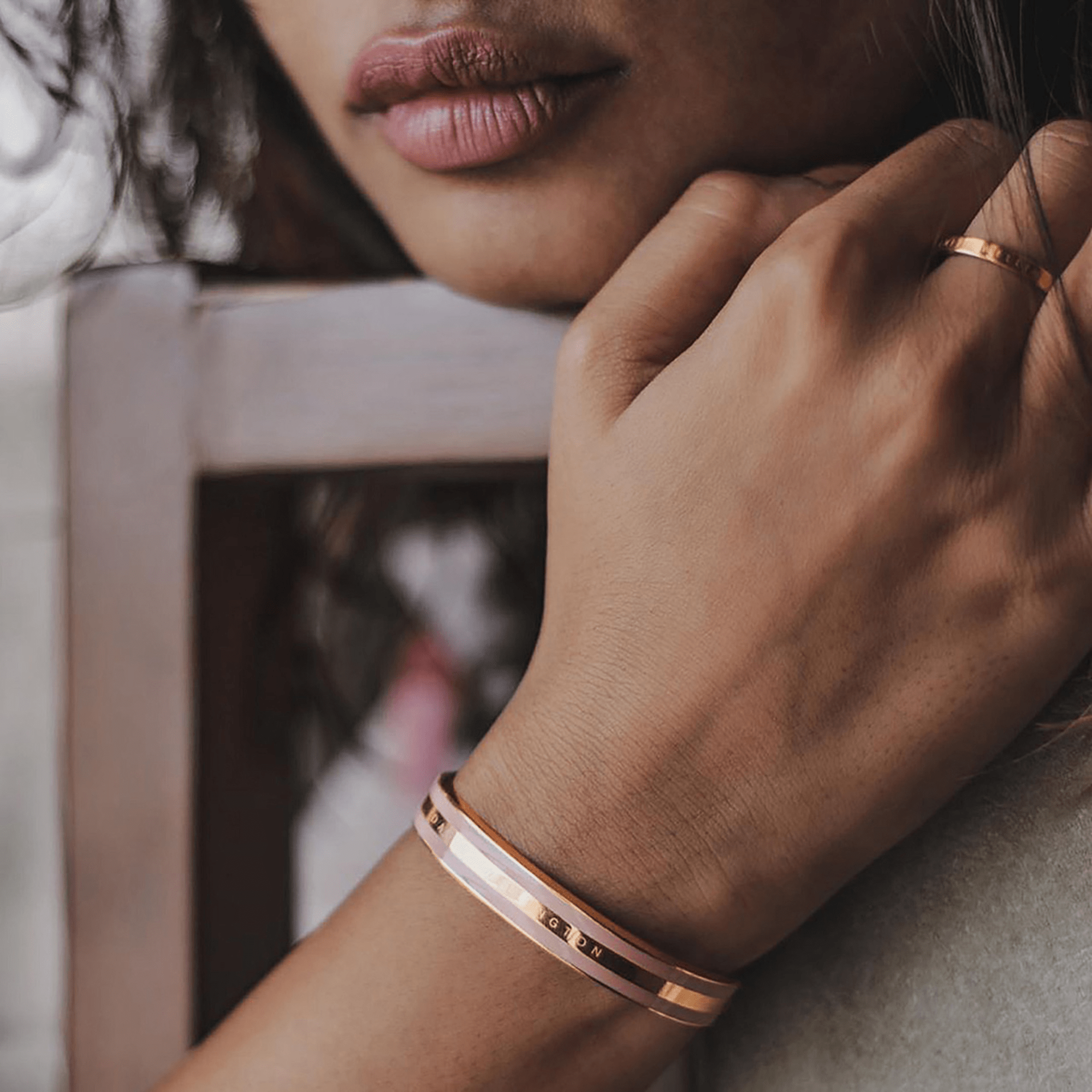 Classic Petite Melrose bangle worn on wrist showing rose gold and pink enamel design