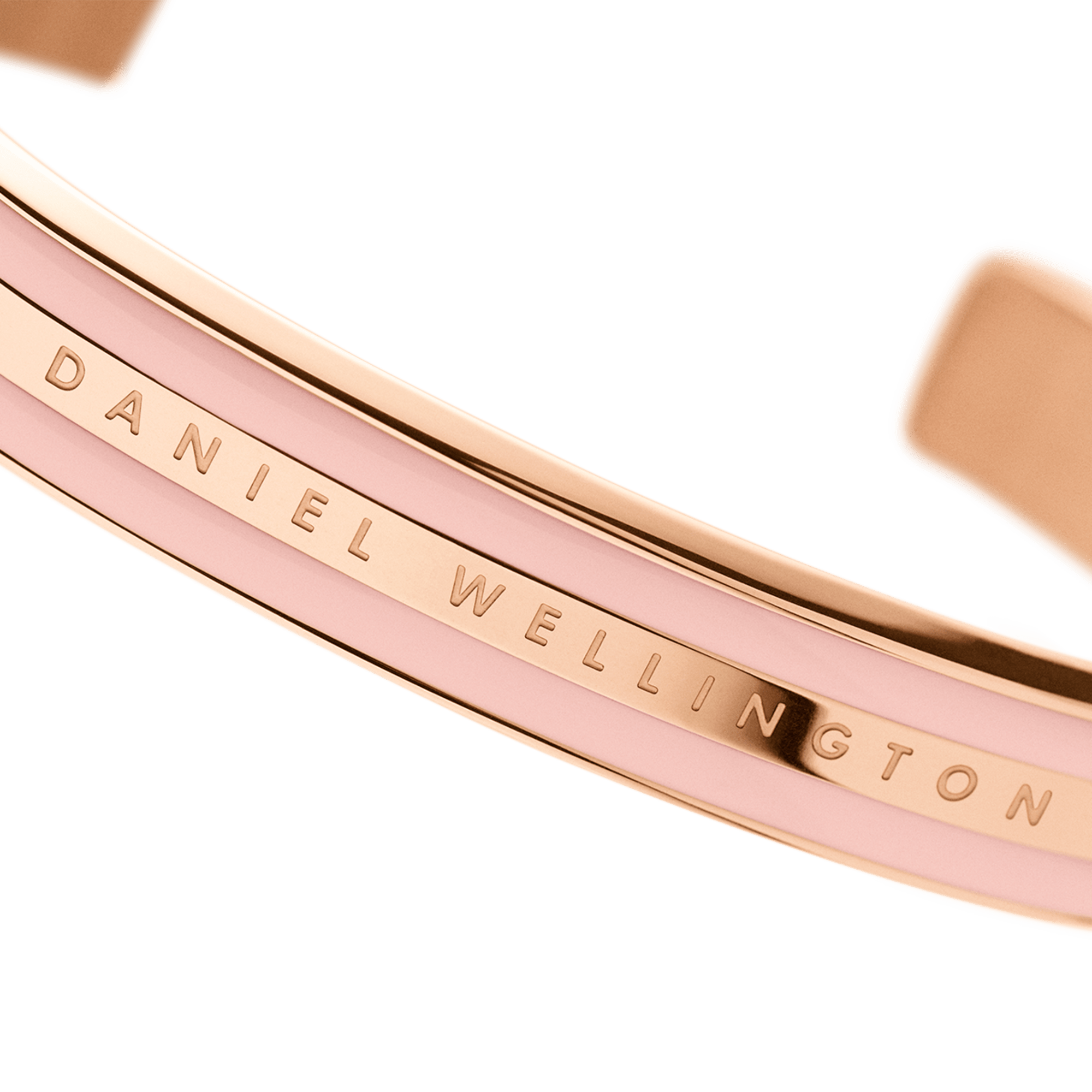 Close-up detail of Classic Petite Melrose bangle engraved text and enamel band finish