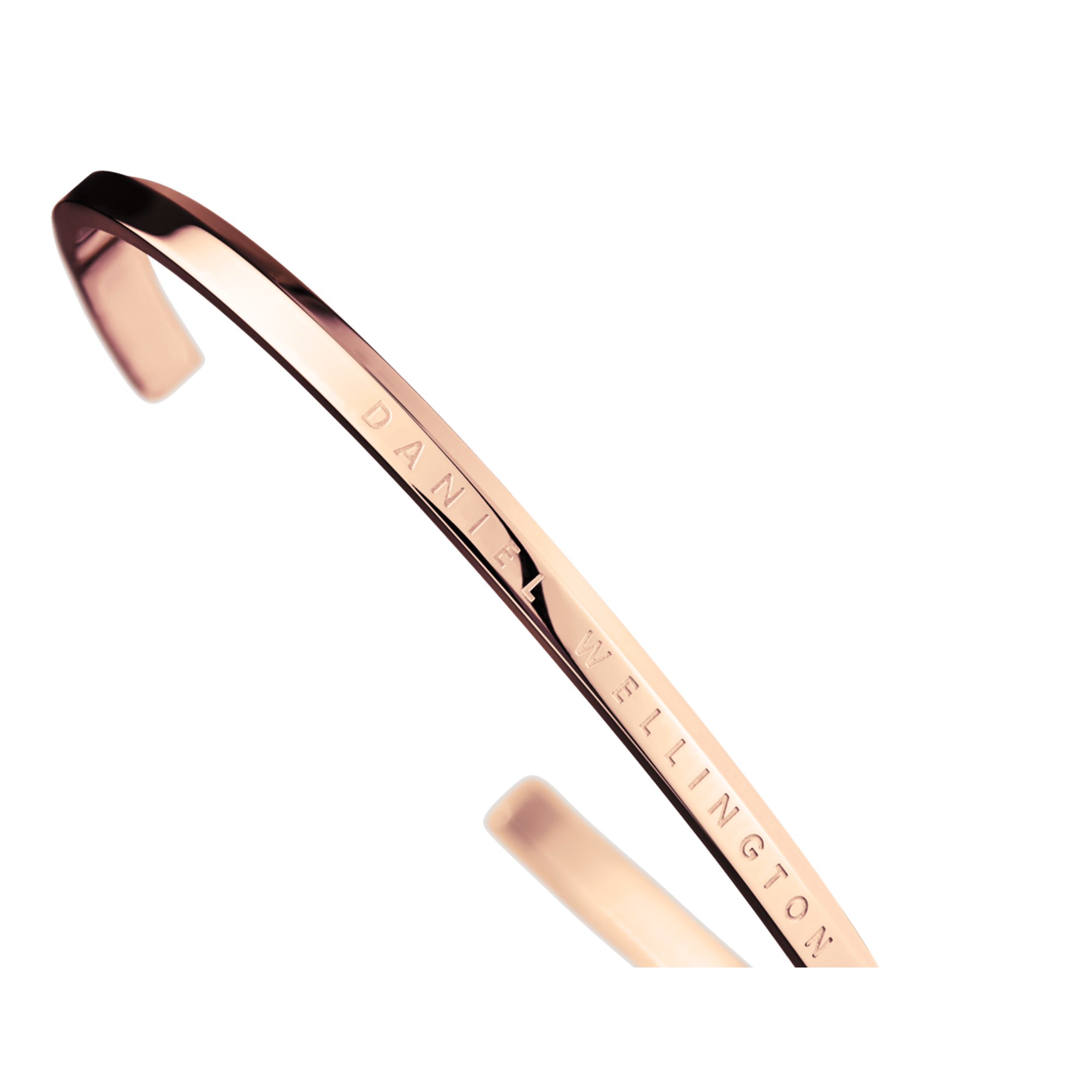 Daniel Wellington rose gold cuff showing interior engraved branding and finish