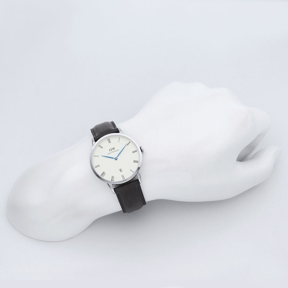 Daniel Wellington Dapper Sheffield 38mm watch worn on wrist with black leather strap