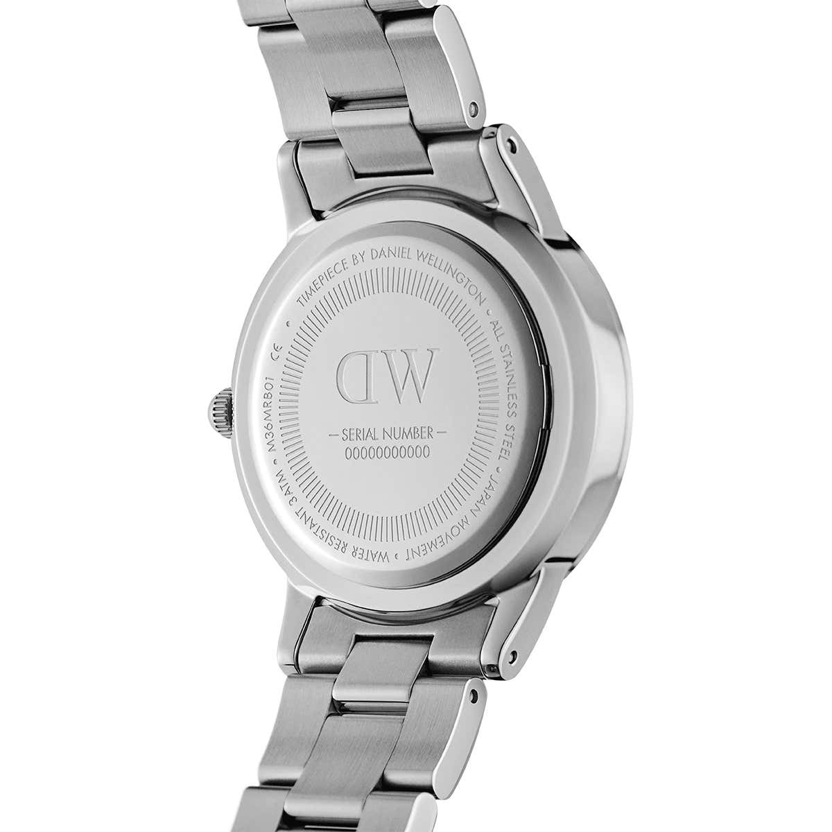 Caseback of Daniel Wellington Iconic Link showing engraved DW logo and serial number