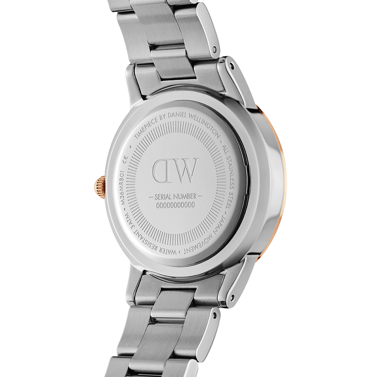 DW Iconic Link Lumine caseback showing brand engraving and serial number on stainless steel
