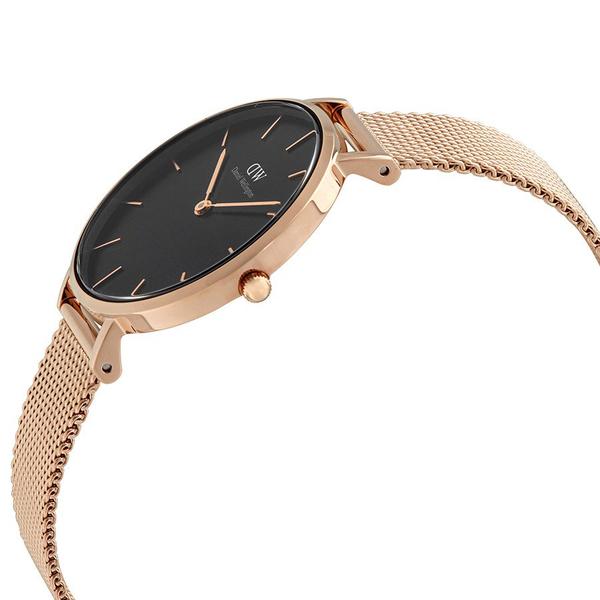 Side angled view of Daniel Wellington Petite Melrose watch showing rose gold case and strap
