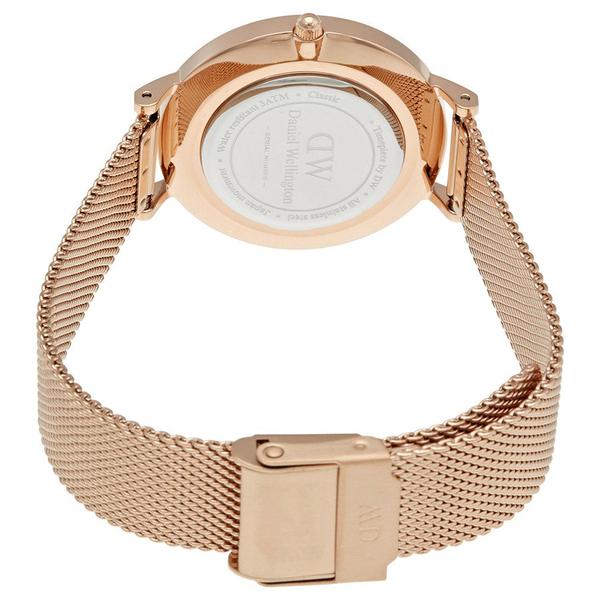 Caseback view of Daniel Wellington Petite Melrose showing engraved rose gold case back and mesh strap