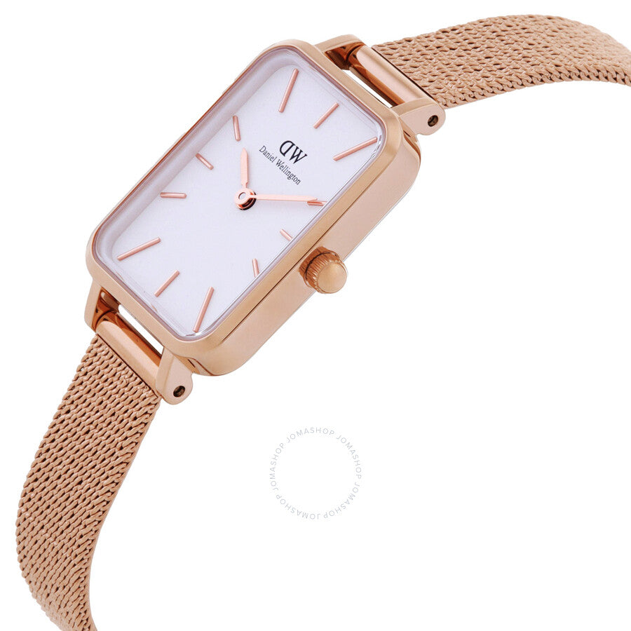 Angled view of Daniel Wellington Quadro watch with rectangular white dial and rose gold case
