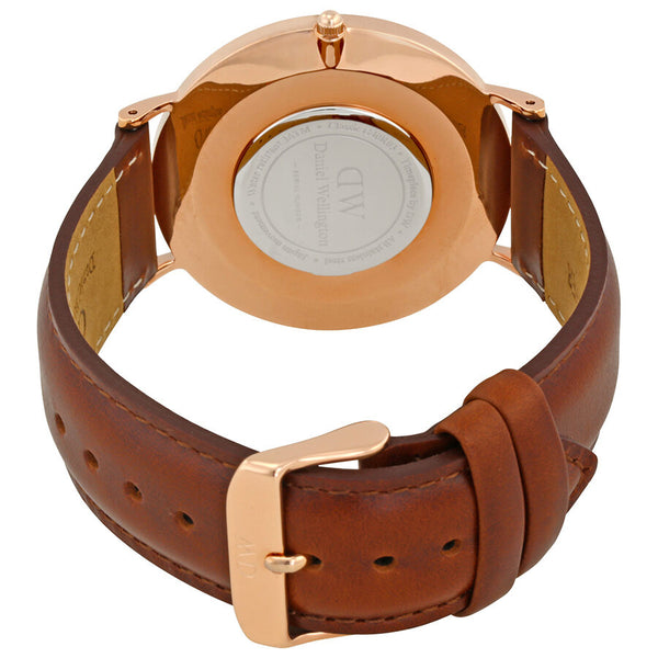 Caseback view of St Mawes watch showing rose gold case, engraved DW logo, and brown leather strap