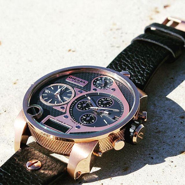 Diesel Big Boss DZ7282 rose gold chronograph watch on wrist outdoors