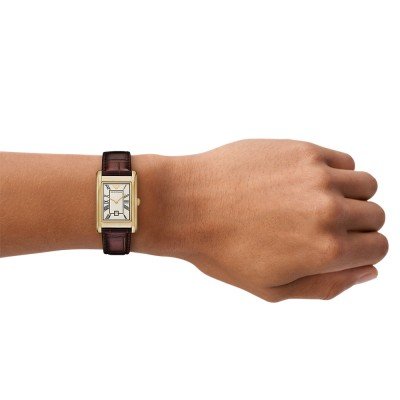 Emporio Armani AR11665 watch worn on wrist with gold case and brown leather strap