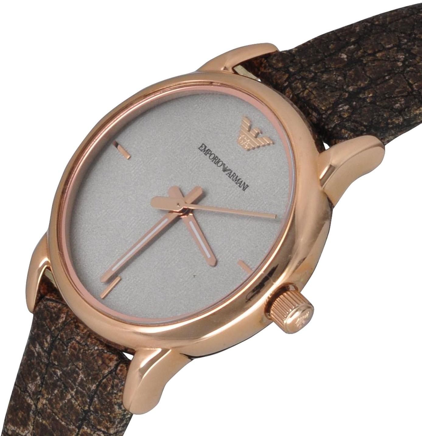 Close-up of AR1813 dial showing rose gold hands, minimalist hour markers, and Emporio Armani branding
