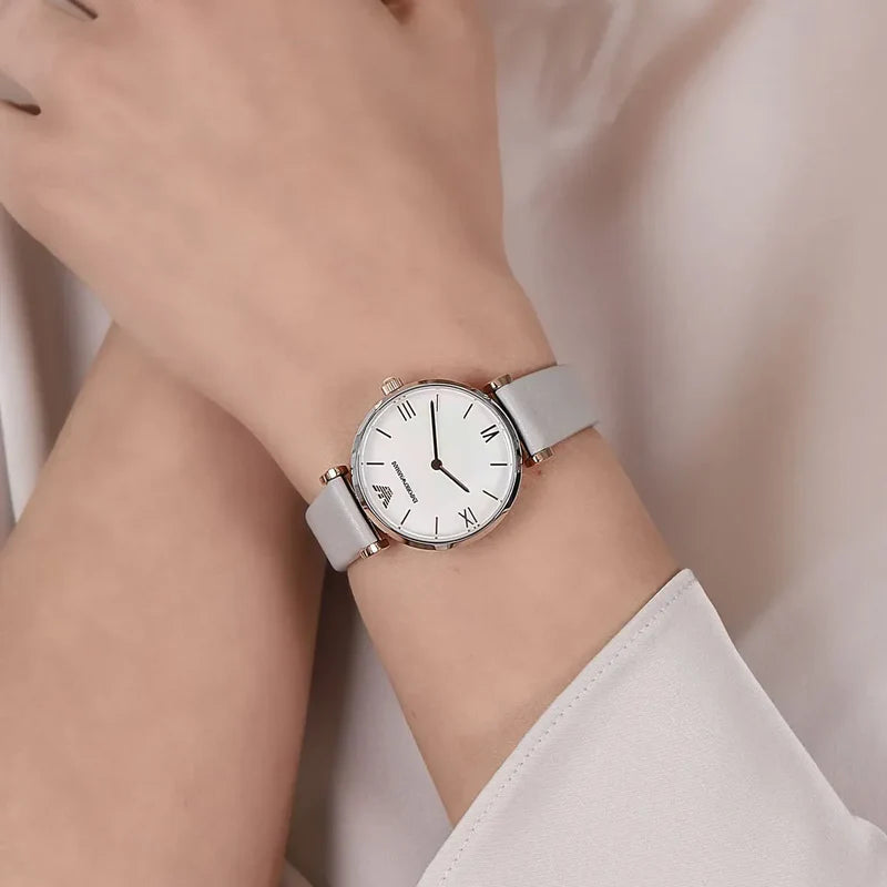 Emporio Armani AR1965 watch worn on wrist showing white dial and gray leather band