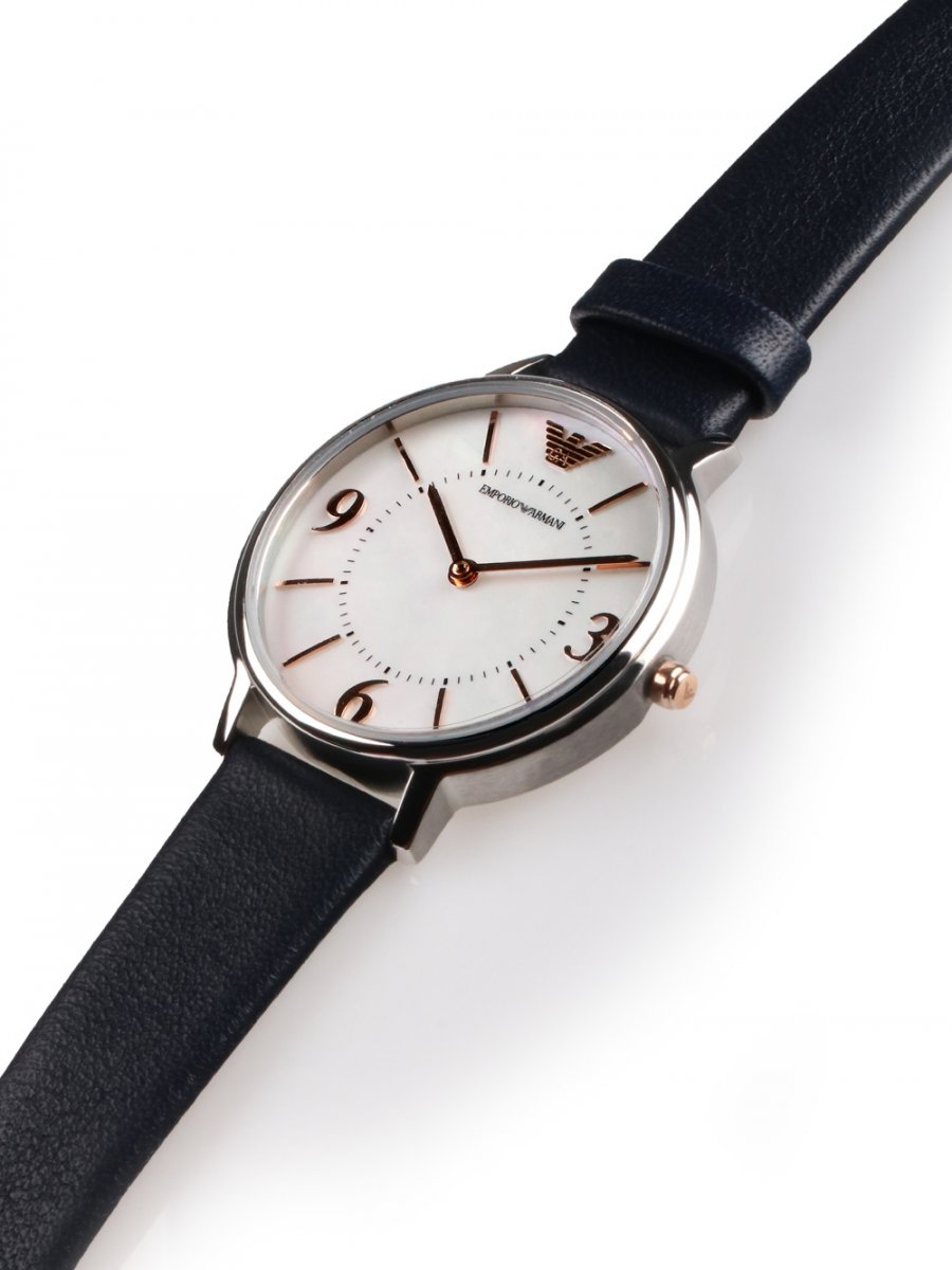 Side profile of Emporio Armani AR2509 showing case thickness and blue leather band attachment