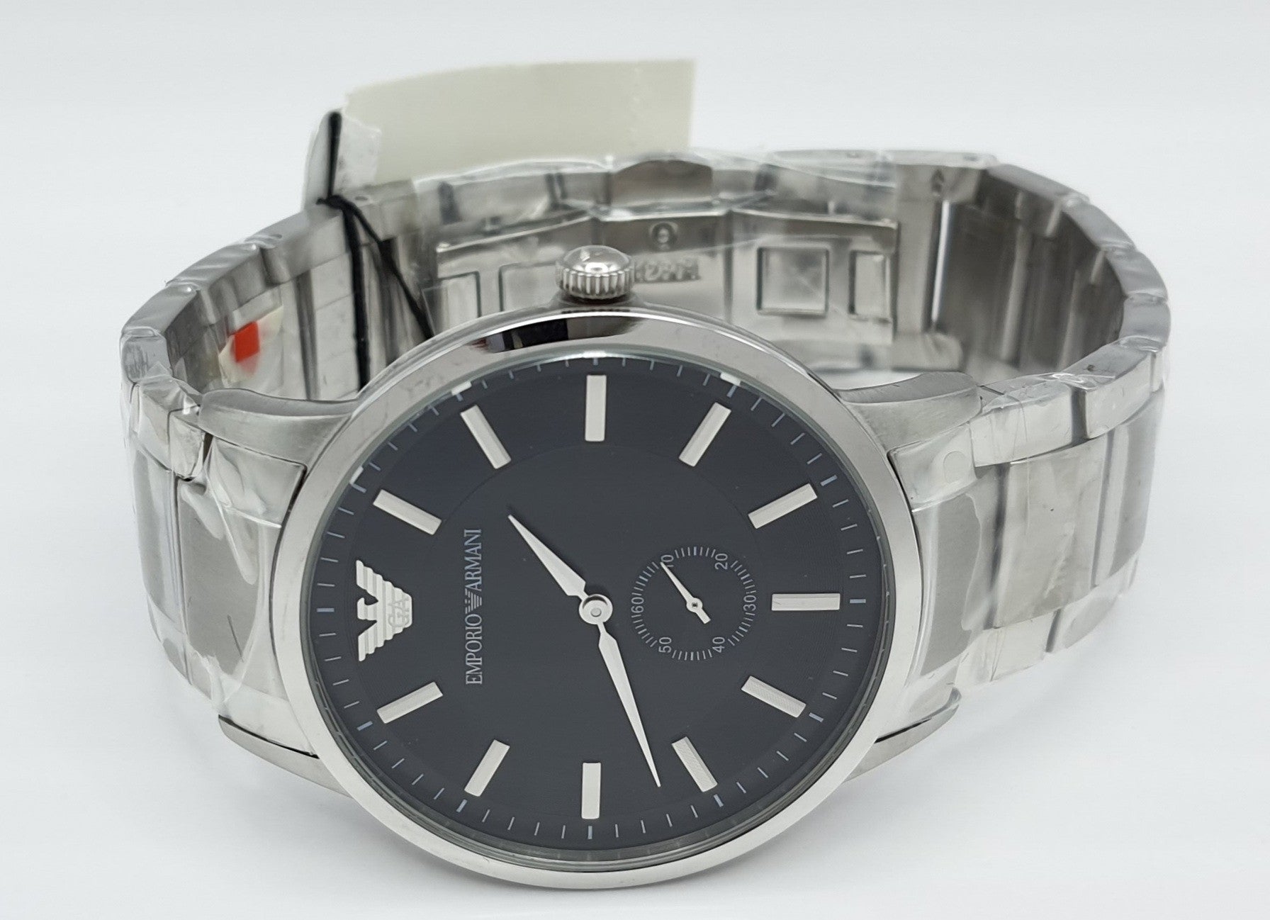 AR9107 men's watch with black dial and small seconds subdial worn on wrist