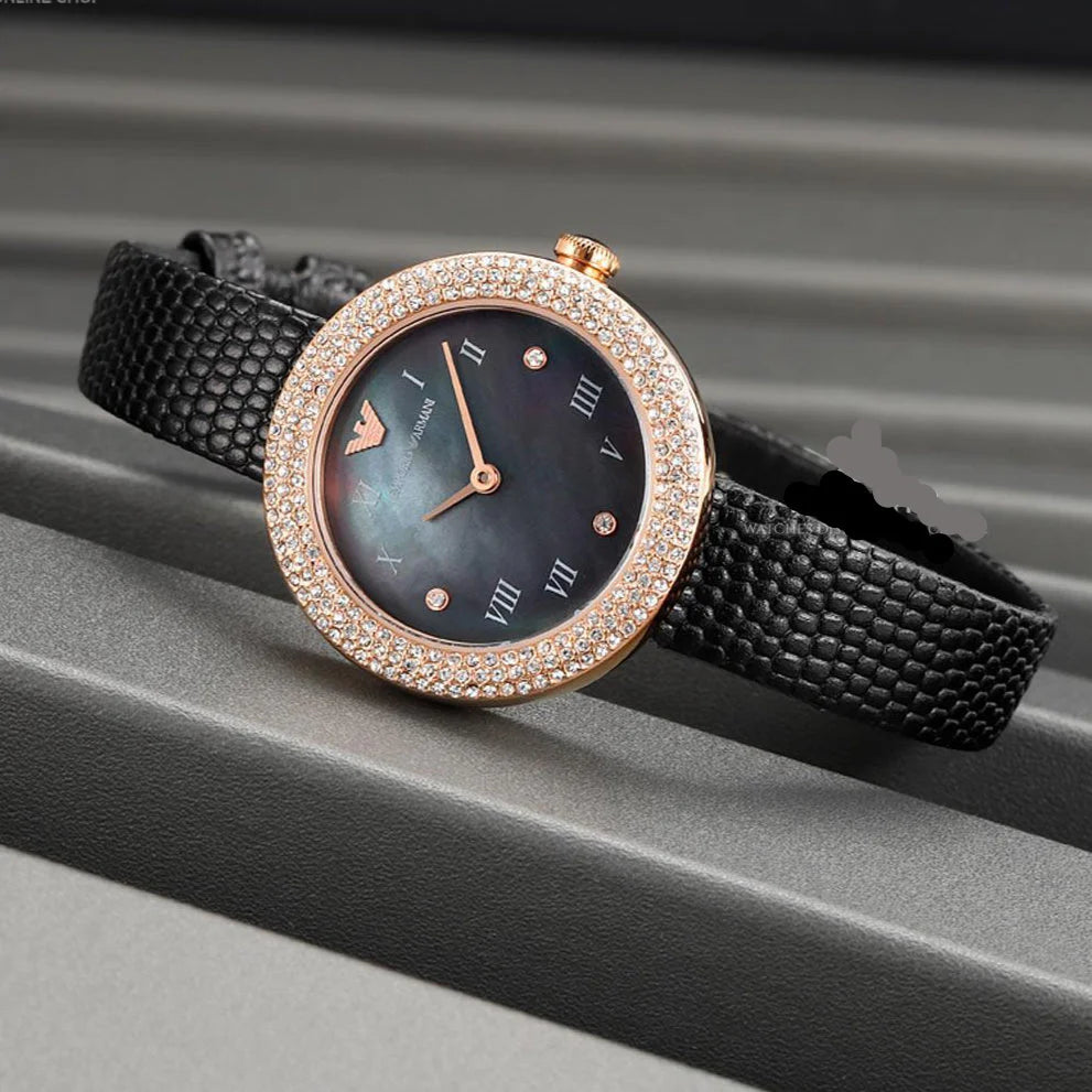 Emporio Armani Aviator Crystals watch worn on wrist with rose gold case and crystal bezel