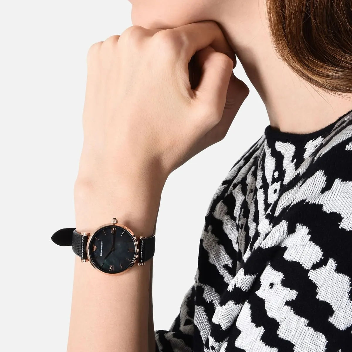 Gianni T-Bar worn on wrist with black textured leather strap and rose gold lugs